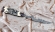 Эксклюзивный нож «Чужой» нержавеющий дамаск, рукоять ламинированный дамаск и бивень моржа со скримшоу