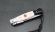 Нож Финка НКВД складная сталь RWL-34 накладки акрил белый+черный с красной звездой со штифтом