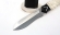 Эксклюзивный Нож Ахиллес сталь Elmax, рукоять рог лося резная, на подставке черный граб + рог лося
