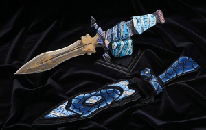 Эксклюзивный нож "Клык" дамаск в ламинате, рукоять дамаск с воронением и бивень мамонта Эксклюзивный нож "Клык" дамаск в ламинате, рукоять дамаск с воронением и бивень мамонта