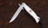 Нож Финка НКВД складная сталь булат полированный накладки акрил белый с красной звездой