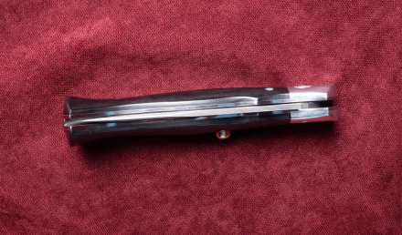 Выкидной нож "Волк" сталь дамаск, накладки G10 черная 