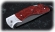 Нож складной Беркут, сталь Х12МФ, рукоять накладки акрил красный с дюралью