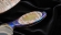 Авторский нож "Дилонг" из ламинированного дамаска, рукоять титан, стабилизированный зуб мамонта и янтарь 