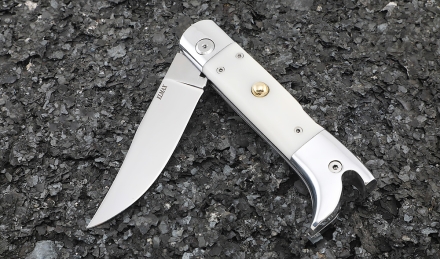 Нож Сапожок выкидной сталь Elmax накладки акрил белый Нож Сапожок выкидной сталь Elmax накладки акрил белый