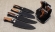 Набор из четрых ножей Шеф S390 рукоять железное дерево на подставке