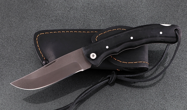 Нож Таежник, складной, сталь Х12МФ, рукоять накладки акрил черный 