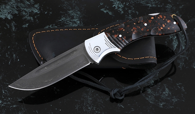 Нож Беркут, складной, сталь Х12МФ, рукоять накладки акрил коричневый с дюралью 