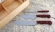Набор кухонных ножей из стали 95Х18 с рукоятью из красного акрила в футляре