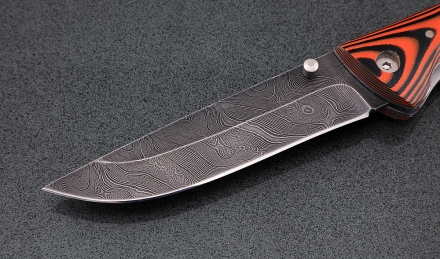 Нож складной Стрелок, сталь дамаск, рукоять накладки микарта оранж Нож складной Стрелок, сталь дамаск, рукоять накладки микарта оранж