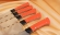 Подставка из венге с магнитными полосами, набором из 4 ножей и тяпки 95х18, G10 оранжевая