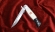 Нож Финка НКВД складная сталь М390 накладки акрил белый+черный с красной звездой